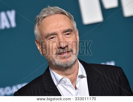 LOS ANGELES - NOV 05:  Roland Emmerich arrives for the 'Midway' World Premiere on November 05, 2019 in Westwood, CA                