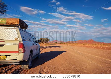 Karas, Namibia - March 30, 2019: Typical 4x4 Rental Car In Namibia Equipped With Camping Gear And A 