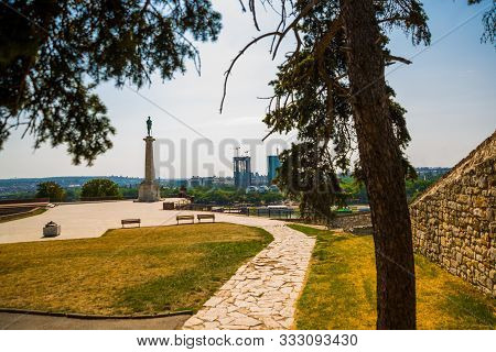 Belgrad, Serbia: Unidentified People At Statue Of Victory In Belgrade. Erected On 1928 To Commemorat
