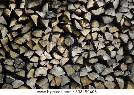 A Wood Pile With Drying Wood Logs