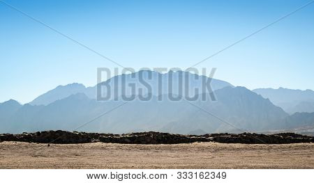 High Rocky Mountains In The Desert In Egypt Dahab