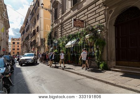Rome, Italy - September 29, 2019: Typical Old Roman Narrow Street. Lovely Italian Restraunt, Walking
