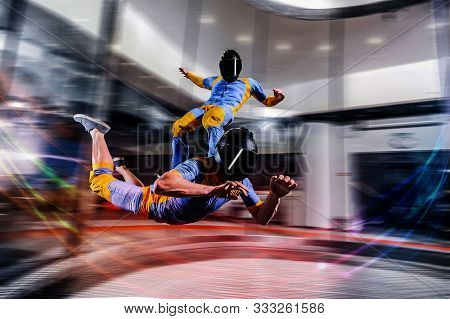 I Flying. Skydiving In Wind Tunnel. New Skydiving Sport In Flight Technology. Indoor Skydiving. Trai