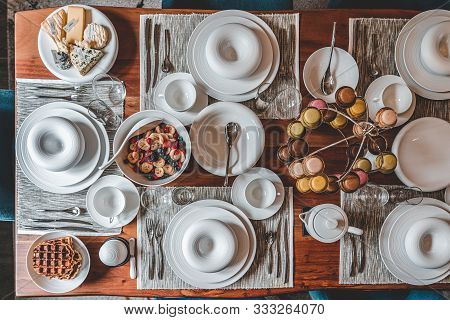 Overheads Shot Of Homemade Brunch With Food And Macarons In Unique Porcelaine Plate