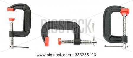 Set metal clamps from different angles isolated on white background. Big size photo
