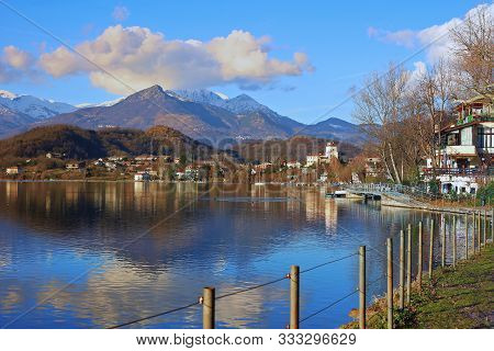 View Of Cute Avigliana Town And Lake With Alps Mountains View