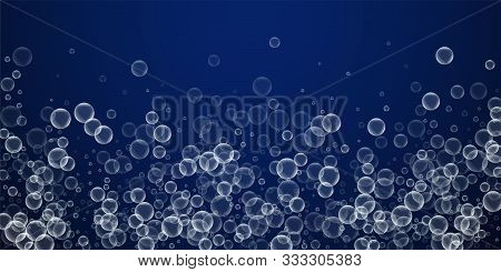 Random Soap Bubbles Abstract Background. Blowing Bubbles On Winter Sky Background. Artistic Soapy Fo