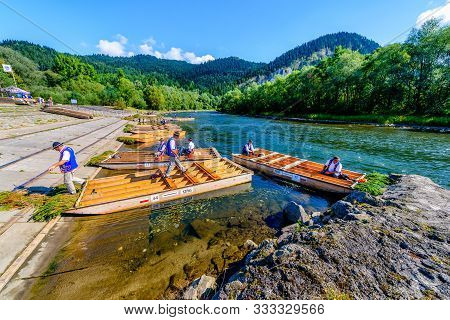 Sromowce Nizne, Poland - August 25, 2015. Dunajec River Gorge. Typical Polish Raftsman Rafts Tourist