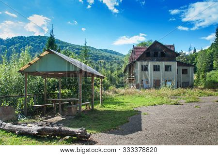 Old Abandoned House In The Mountains. Background