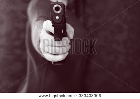 Gun Girl Points A 9 Mm Caliber Snub Nose Revolver Weapon Right At The Viewer. Concept Self-protectio
