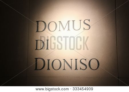 Italy, Brescia - December 24 2017: The View Of The Lettering On Wall In The Museum Of Santa Giulia, 