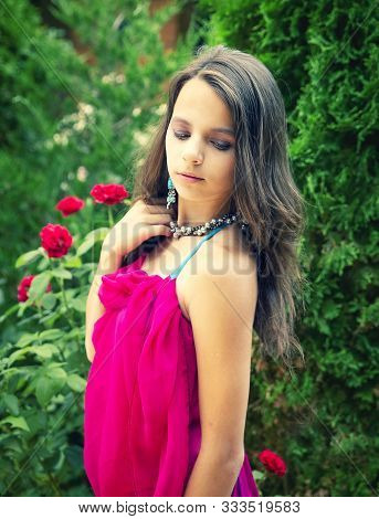 Outdoor Fashion Portrait Of Young Beautiful Lady Wearing Trendy Earrings, Stylish Pearl Necklace And