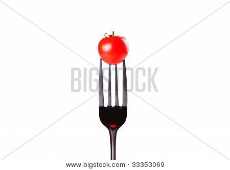 건강 한 음식입니다. 빨간 신선한 토마토와 포크