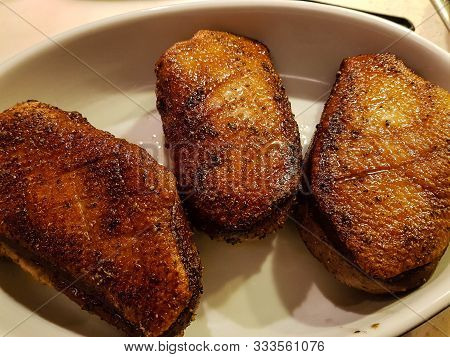 Fried Duck Breast With Red  Cabbage And Croquettes
