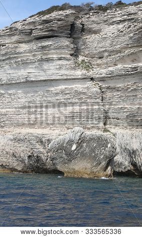 Rocks And Cliffed Coast And The Mediterranean Sea In Corsica Island