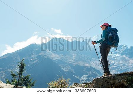 Couple Following Everest Base Camp Trekking Route Near Dughla 4620m. Backpackers Carrying Backpacks 