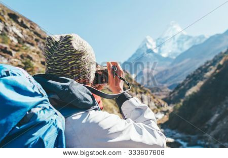 Couple Following Everest Base Camp Trekking Route Near Dughla 4620m. Backpackers Carrying Backpacks 