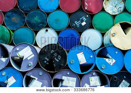 Old Chemical Barrels. Blue, Green, And Red Oil Drum. Steel Oil Tank. Toxic Waste Warehouse. Hazard C