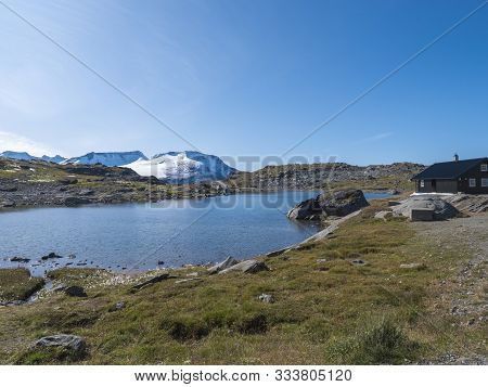 View From Sognefjellshytta With Blue Glacial Lake Fantesteinsvatnet Along Road 55 National Scenic Ro