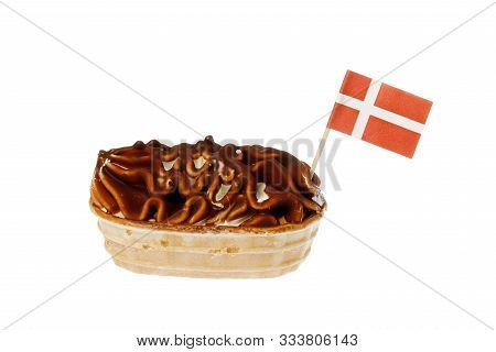 One Chocolate Covered Ice Cream Boat With A Dansih Flag Flying Isolated On White Background.
