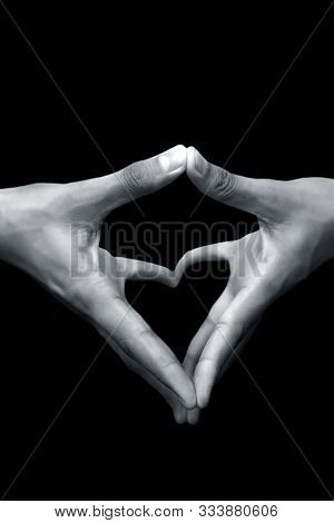 Close Up Shot Of Pair Of Human Hands With Open Hands Stretched And Doing Yoni Mudra Or Feminine Adi
