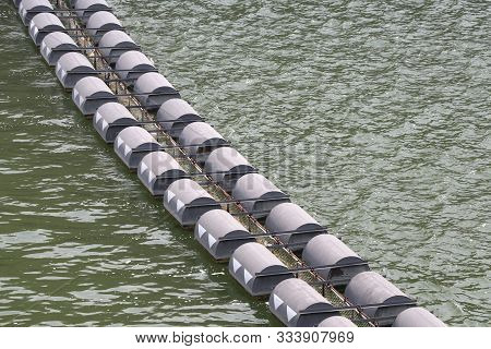 Buoys For Blocking Debris Around The Dam. Buoys That Float On The Surface.