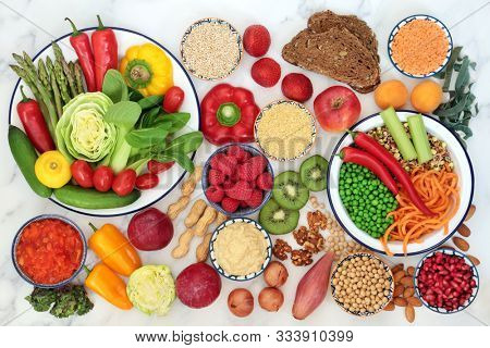 Low glycemic health food for diabetics also high in antioxidants, vitamins, minerals, smart carbs & omega 3 fatty acids. Below 55 on the GI index. Top view on marble.
