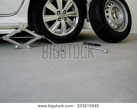 Tool Kit For Changing Car Tires. Jack Lifts Important For Change Spare Tire.