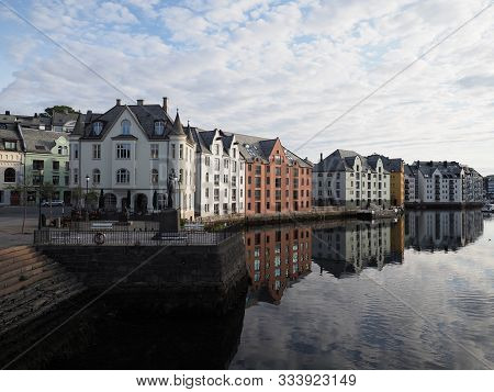 Alesund, Norway On July 2019: Famous Secessionist Buildings Reflected In Water At Romsdal Region Wit