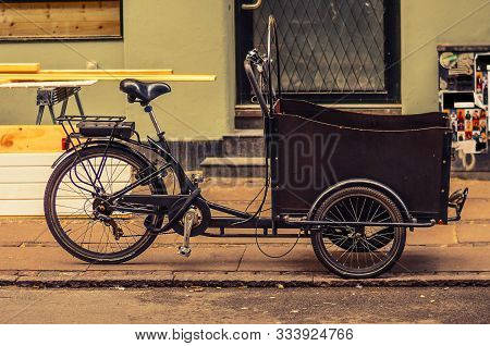 Tricycle (bicycle) Bike With A Basket On The Street Of Copenhagen, Denmark