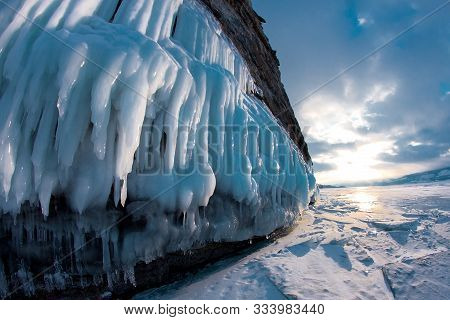 Ice On Lake Baikal. Winter Ice On Lake Baikal. Crystal Clear Drinking Water. The Floe On Lake Baikal
