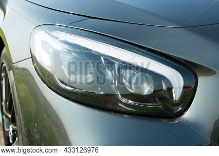 Dnepropetrovsk, Ukraine - 08.24.2021: Photos Of Mercedes Benz Sl550 Convertible. Headlight. Detailin