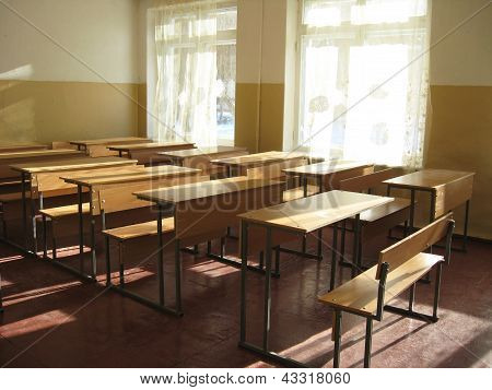 empty classroom with desks