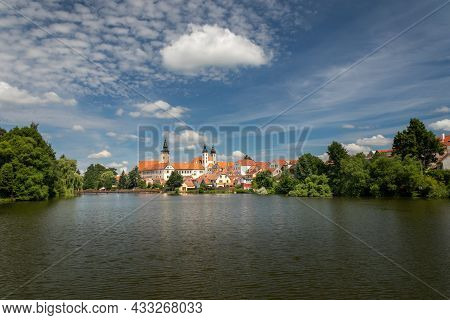 Telc, Czech Republic - 07 16 2021: Telc Cityscape, In The Background Church Of The Name Of Jesus, In