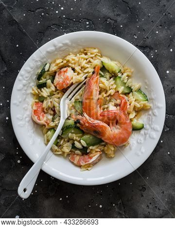 Delicious Mediterranean Lunch - Creamy Orzotto With Shrimp And Zucchini On A Dark Background, Top Vi