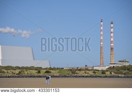 Beautiful Closeup Bright View Of Iconic Poolbeg Ccgt Station Chimneys And Covanta Plant (dublin Wast