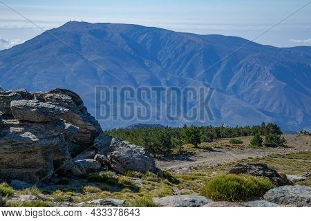 Mountains Landscape In Sierra Nevada With A Rock And Pine Forest