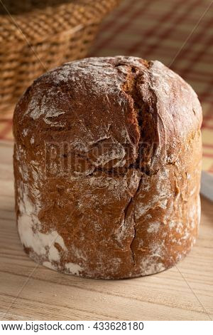 Fresh baked Bayerisches wiesn brot close up on a cutting board
