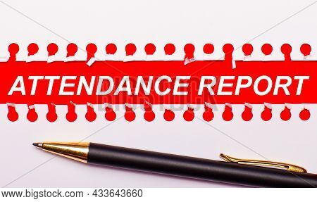Pen And White Torn Paper Strip On A Bright Red Background With The Text Attendance Report