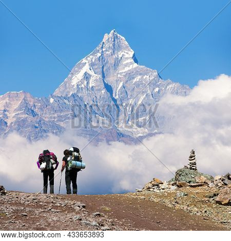 View Of Mount Machhapuchhre Or Machhapuchhare With Two Tourists, Annapurna Area, Nepal Himalayas Mou