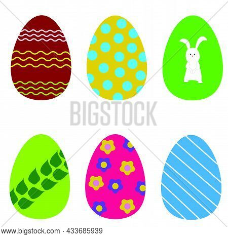 A Set Of Multi-colored Painted Easter Eggs, Which Are Decorated With Stripes, Polka Dots, Flowers, A