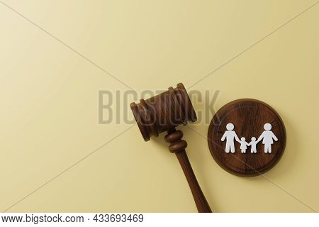 Top View Of Judge Gavel And Icon Human Family. Family Law Or Divorce, Legality, Adoption Concept. 3d