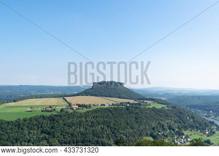 Konigstein Fortress, Germany - 04.04.2021: The Main Subject Is Out Of Focus, Summer Castle Blue Sky 