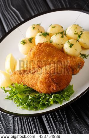 Wiener Backhendl Austrian Breaded Fried Chicken With Boiled Potatoes Close Up In The Plate On The Ta