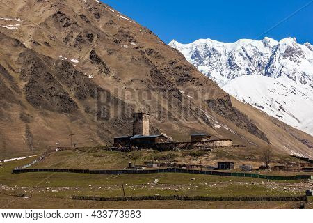 View Of The Ushguli Village At The Foot Of Mt. Shkhara. Lamaria Monastery, Old Rock Tower