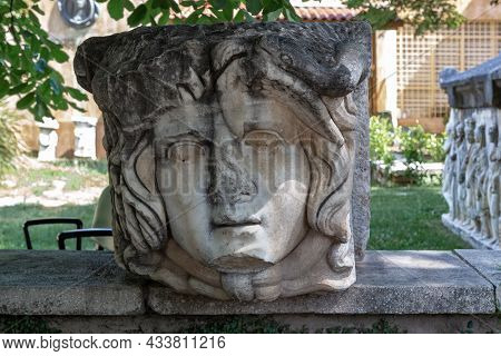 Geyre, Turkey - May 30, 2021: This Is The Face Of Medusa The Gorgon On An Antique Sarcophagus In A M