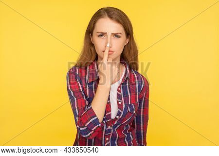 You Lie. Portrait Of Upset Ginger Girl In Checkered Shirt Pointing At Nose, Showing Liar Gesture And