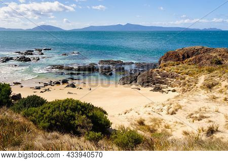 Spiky Beach Is A Remote Sandy Beach With A Rocky Shore Surrounded By Low Hills - Swansea, Tasmania, 
