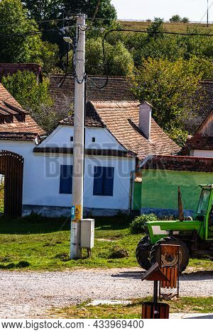 View Of Picturesque Village Viscri In Romania. Painted Traditional Old Houses In Medieval Saxon Vill