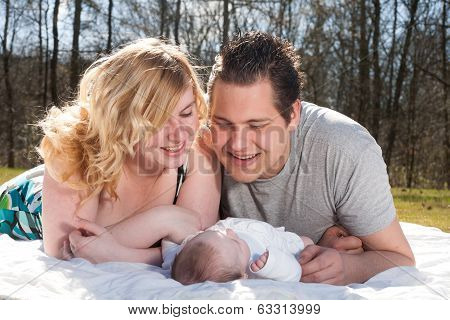 Loving Parents And Their Girl